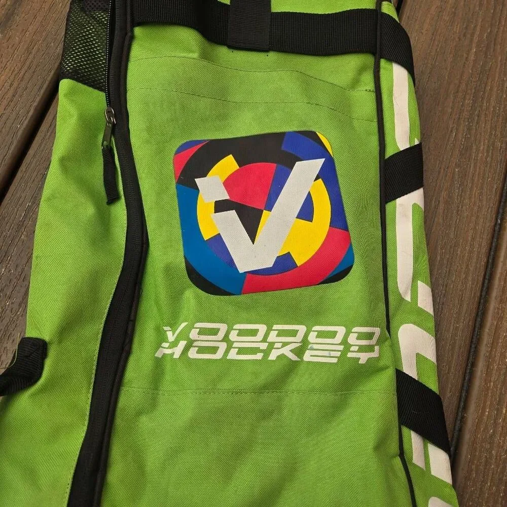 Voodoo Hockey Bag green and black back pack straps easy carry, pockets